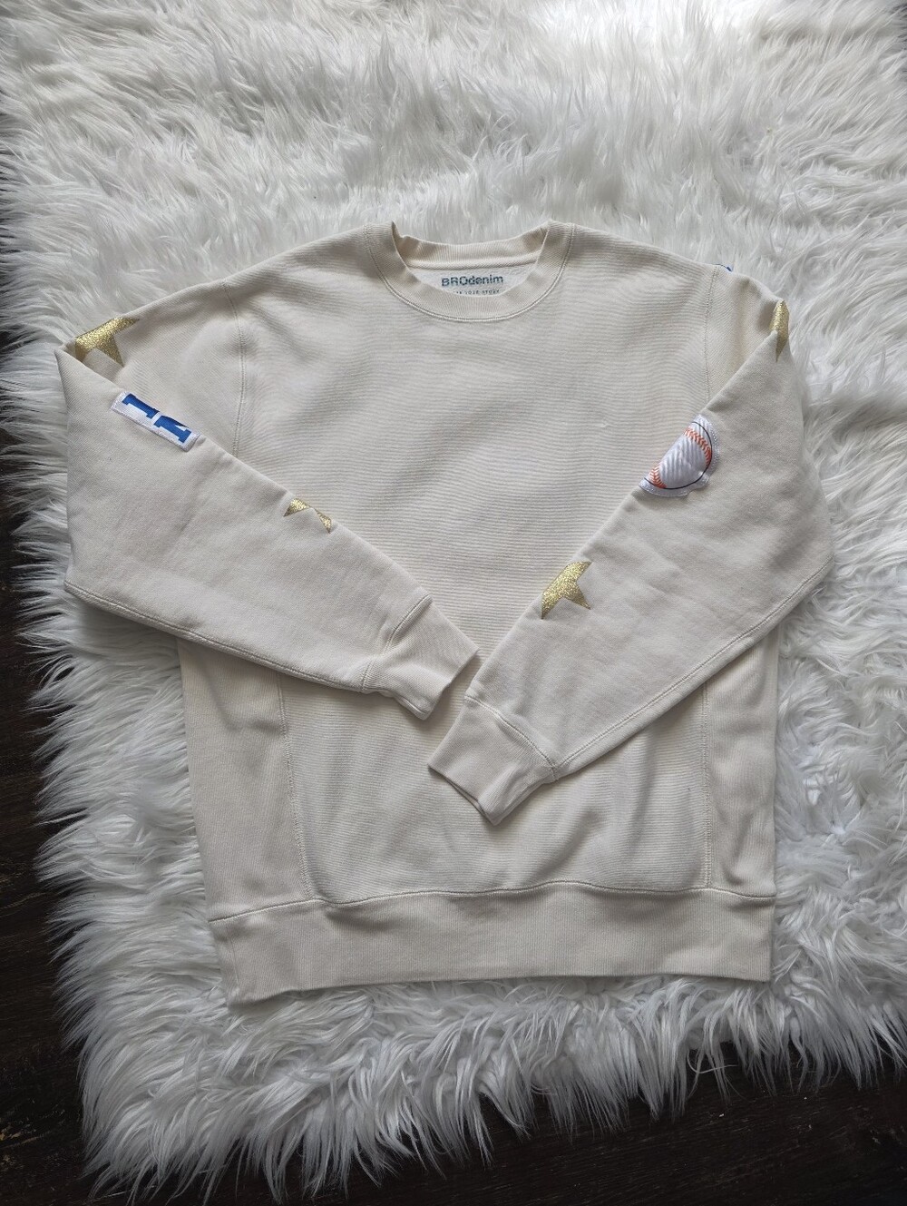 Cream Crewneck Sweater with Gold Star Accents
